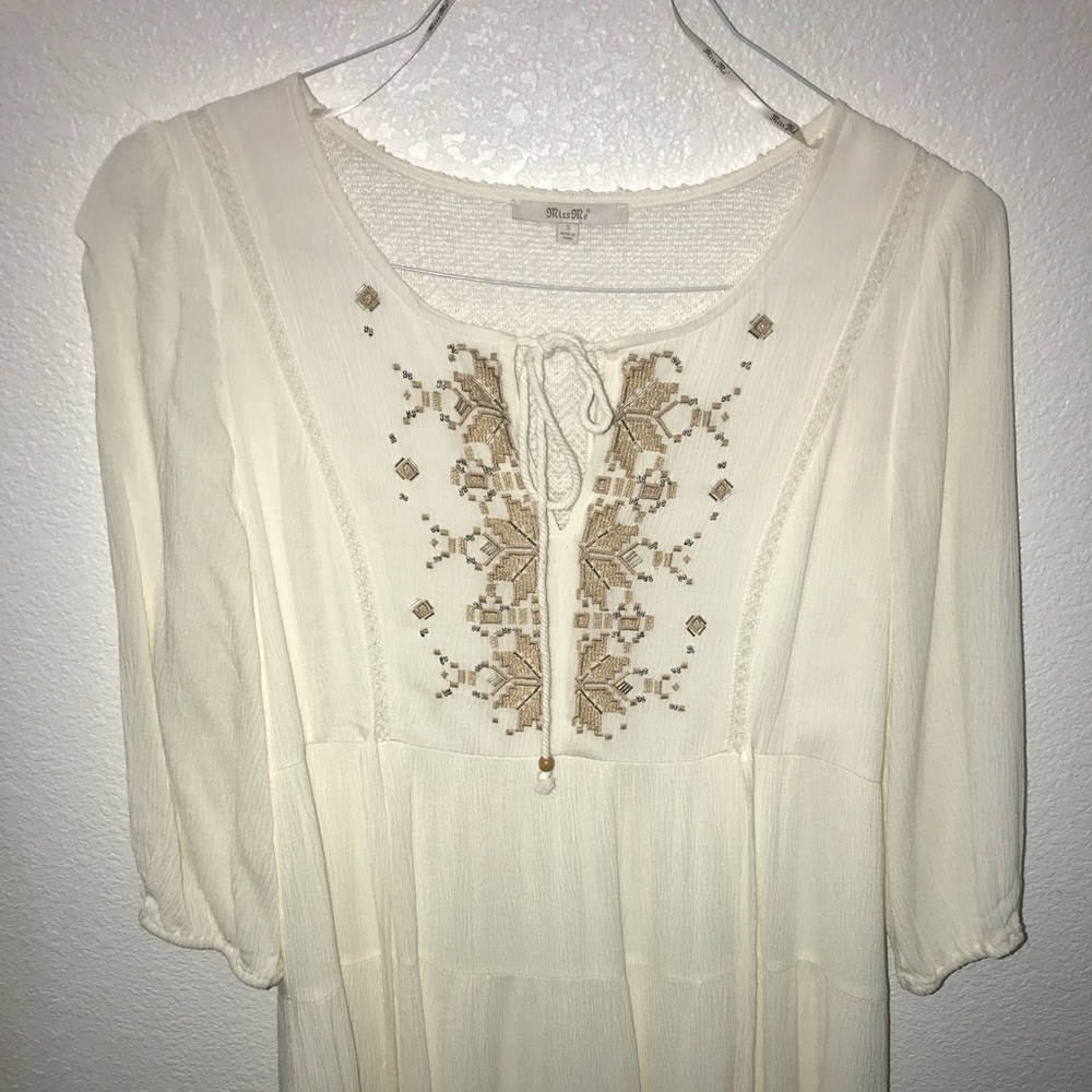 White dress with gold accents